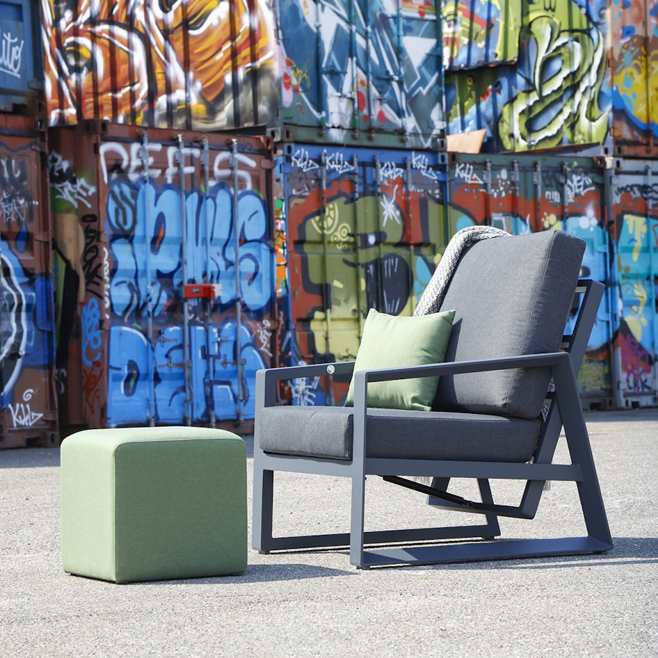 Dazzling reclining lounge chair with crea puff green outdoor scene 01